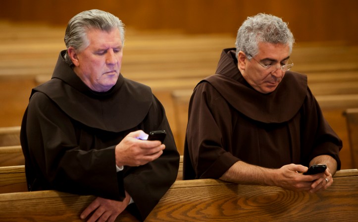 Franciscan brothers read prayer requests from cell phones at New Jersey friary